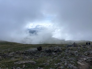 Lost in the clouds and climbing elevation.